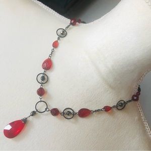 Faceted vampire blood glass gunmetal floating bead necklace